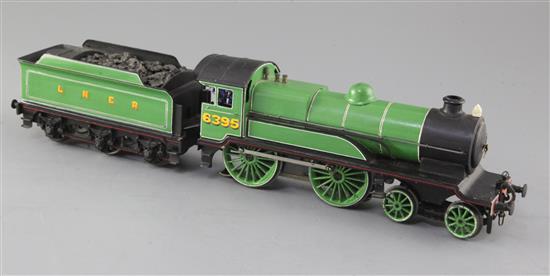 A Leeds model Co O gauge 4-4-0 LNER locomotive and tender, number 6395, green livery, 3 rail, overall 41cm, needs attention
